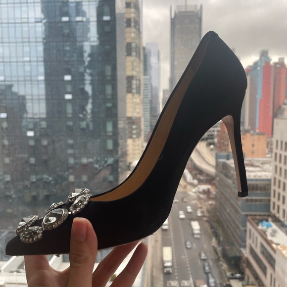 Italian high heel shoes with diamond embellishments.